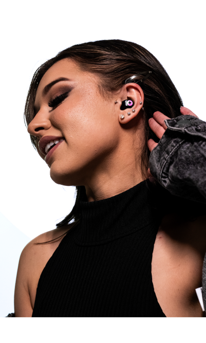 Model wearing LUMENEARZ Aura HiFi Earplugs